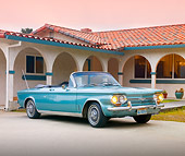 AUT 22 RK2983 01
1964 Chevrolet Corvair Monza Convertible Green 3/4 Front View On Driveway By House