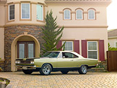 AUT 22 RK2985 01
1969 Plymouth GTX Ice Green 3/4 Front View On Brick By House