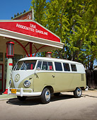 AUT 22 RK3015 01
1960 Volkswagen Kombi Microbus Green And Gray 3/4 Front View By Gas Station