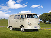 AUT 22 RK3021 01
1966 VW Sundial Camper Pearl White 3/4 Front View On Grass