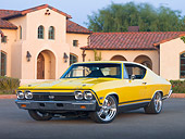 AUT 22 RK3038 01
1968 Chevrolet Chevelle SS 396 Yellow 3/4 Front View On Pavement By House