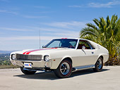 AUT 22 RK3045 01
1969 AMC AMX White With Red Stripe 3/4 Front View On Pavement By Palm Tree