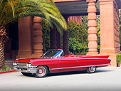 AUT 22 RK3053 01
1962 Cadillac Series 62 Convertible Red 3/4 Front View On Pavement By Trees And Building