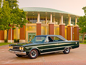 AUT 22 RK3090 01
1967 Plymouth Hemi GTX Dark Green 3/4 Front View On Pavement By Brick Building