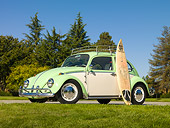 AUT 22 RK3109 01
1967 Volkswagen Bug Green And White 3/4 Side View On Pavement By Grass And Trees
