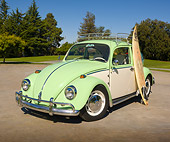 AUT 22 RK3111 01
1967 Volkswagen Bug Green And White 3/4 Front View On Pavement By Grass And Trees