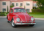 AUT 22 RK3117 01
1964 Volkswagen Beetle Red 3/4 Front View On Pavement By House