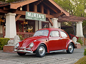 AUT 22 RK3119 01
1964 Volkswagen Beetle Red 3/4 Front View On Pavement By Storefront
