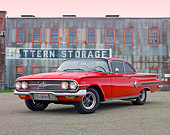 AUT 22 RK3149 01
1960 Chevrolet Impala Red 3/4 Front View On Pavement By Old Building