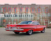 AUT 22 RK3152 01
1960 Chevrolet Impala Red 3/4 Rear View On Pavement By Old Building