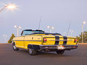 AUT 22 RK3158 01
1963 Chevrolet Nova SS Convertible Yellow With Black Stripes 3/4 Rear View On Pavement At Dusk