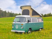 AUT 22 RK3204 01
1969 Volkswagen Westfalia Camper Green And White 3/4 Front View On Grass