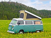 AUT 22 RK3206 01
1969 Volkswagen Westfalia Camper Green And White 3/4 Side View On Grass
