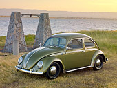 AUT 22 RK3215 01
1963 Volkswagen Beetle Green 3/4 Front View On Grass By Water