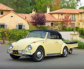 AUT 22 RK3225 01
1967 VW Beetle Convertible Yukon Yellow With Trailer 3/4 Front View On Pavement By House