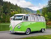AUT 22 RK3242 01
1963 VW 23 Window Microbus Deluxe Bright Green And Pearl 3/4 Front View On Pavement By Grass And Trees