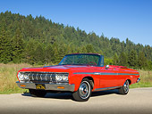 AUT 22 RK3289 01
1964 Plymouth Sport Fury Convertible Red 3/4 Front View On Road By Evergreen Trees