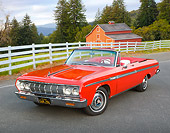AUT 22 RK3292 01
1964 Plymouth Sport Fury Convertible Red 3/4 Front View On Pavement By Fence And Barn