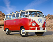 AUT 22 RK3372 01
1967 Volkswagen Type II Microbus Deluxe Red And White 3/4 Front View On Pavement In Desert