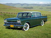 AUT 22 RK3383 01
1960 AMC Rambler Deluxe Green 3/4 Front View On Grass By Road
