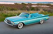 AUT 22 RK3437 01
1960 Chrysler New Yorker Convertible Turquoise 3/4 Side View On Pavement By Bay At Dusk