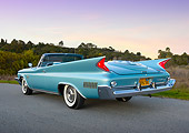 AUT 22 RK3440 01
1960 Chrysler New Yorker Convertible Turquoise 3/4 Rear View On Pavement By Grass At Dusk