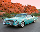AUT 22 RK3453 01
1962 Chrysler Newport Turquoise 3/4 Front View On Pavement By Red Rock