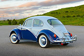 AUT 22 RK3462 01
1967 Volkswagen Beetle Blue And Aqua 3/4 Rear View On Pavement By Grassy Hills
