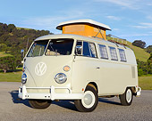 AUT 22 RK3464 01
1966 Volkswagen Camper Cream 3/4 Front View On Pavement By Grassy Hills
