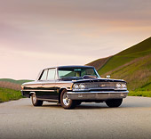 AUT 22 BK0004 01
1963 Ford Galaxie 500 XL Black 3/4 Front View On Pavement By Hills