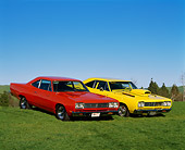 AUT 22 RK0004 02
1969 Plymouth Road Runner Red And Yellow 3/4 Front View On Grass