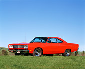 AUT 22 RK0005 02
1969 Plymouth Road Runner Red 3/4 Side View On Grass Blue Sky