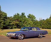 AUT 22 RK0099 01
1963 Dodge Polara 500 3/4 Front View On Pavement By Grass And Trees