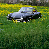 AUT 22 RK0172 02
1965 Alfa Romeo Giulietta SS Black 3/4 Front View On Grass Field
