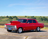 AUT 22 RK0197 03
1966 Chevrolet Nova Red 3/4 Side View On Pavement Hills Background