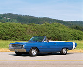 AUT 22 RK0201 03
1969 Dodge Dart 340 GTS Convertible Blue 3/4 Front View On Pavement By Grass And Trees