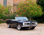 AUT 22 RK0485 05
1969 Plymouth Barracuda Convertible Black 3/4 Front View On Pavement By Trees