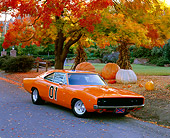 AUT 22 RK0976 03
1968 Dodge Charger 440 Orange 3/4 Front View On Pavement By Fall Trees And Pumpkins