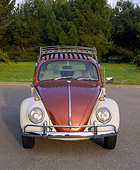 AUT 22 RK1004 01
1965 VW Beetle Steel Sunroof Copper And White Head On Shot On Pavement By Grass And Trees