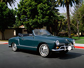 AUT 22 RK1028 03
1966 VW Karmann Ghia Convertible Turquoise 3/4 Side View On Pavement