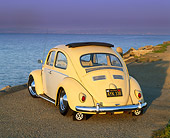 AUT 22 RK1057 01
1960 VW Beetle With Sunroof Yellow 3/4 Rear View On Pavement