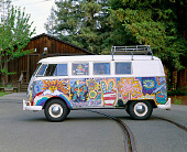 AUT 22 RK1090 04
1965 VW Kombi Hippie Bus Profile Shot On Pavement By Trees
