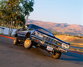 AUT 22 RK1137 03
1966 Chevy Impala Lowrider Purple Slanted 3/4 Front On Pavement