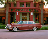 AUT 22 RK1166 02
1961 AMC Rambler Ambassador Custom Red 3/4 Side View By Restaurant
