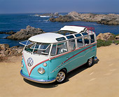 AUT 22 RK1219 08
1967 Volkswagen 21-Window Bus Ragtop Light Blue And White Overhead 3/4 Front View On Sand By Ocean