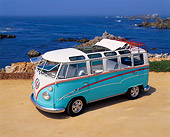 AUT 22 RK1220 01
1967 Volkswagen Bus Ragtop 21-Window Light Blue/White Overhead 3/4 Front View On Sand By Water