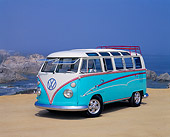 AUT 22 RK1221 04
1967 Volkswagen Bus Ragtop 21-Window Light Blue And White 3/4 Front View On Sand
