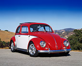 AUT 22 RK1224 04
1962 Volkswagen Ragtop Bug Red And White 3/4 Front View On Pavement Blue Sky