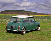 AUT 22 RK1292 03
1964 Austin Mini Cooper Green White Top 3/4 Rear View On Grass Field