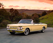 AUT 22 RK1299 02
1963 Chevrolet Corvair Turbo Spyder 3/4 Front View On Pavement By Hills